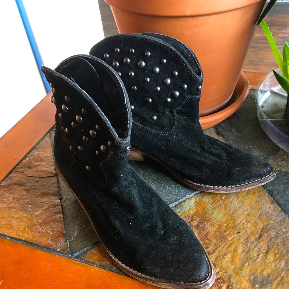 Black studded ankle boots with pointed tip